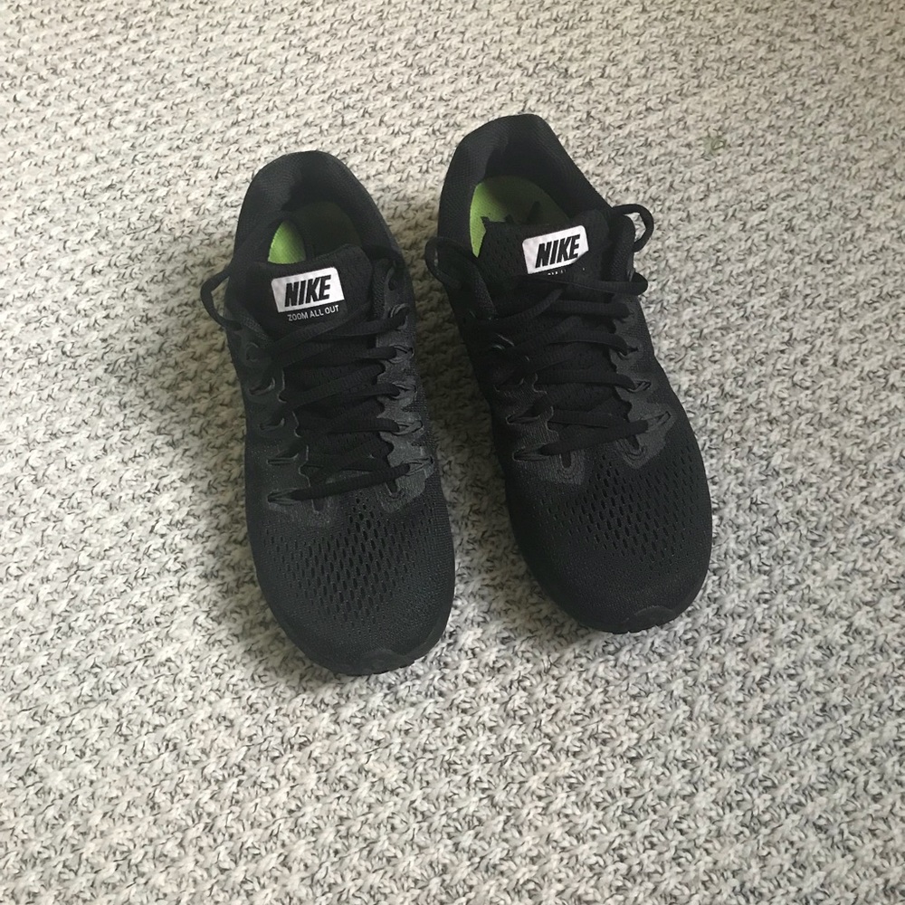 Black Nike running shoes